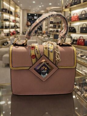 Elegant Pink Top-Handle Satchel with Gold Accents